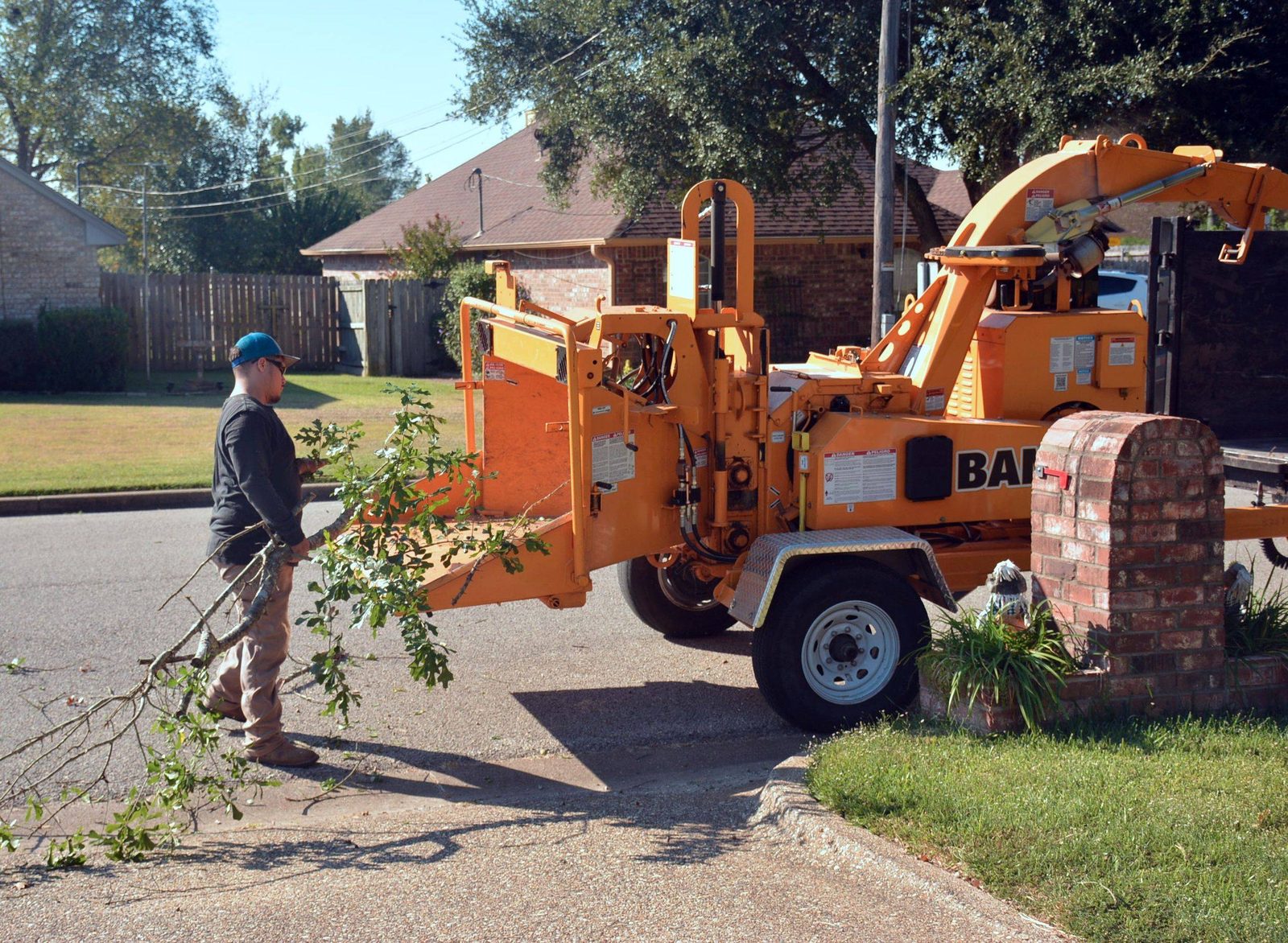 A Tree Removal Douglasville crew member at work on a job near Douglasville, Douglas County